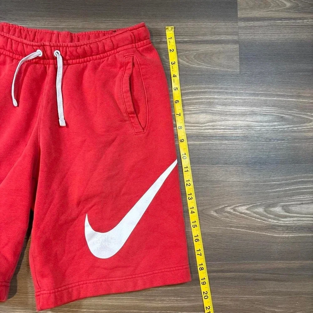 Nike red cotton & polyester shorts with white swoosh